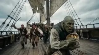 Handheld Running Shot with Gold Coins Underwater